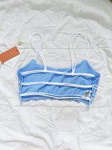 Top Tiras